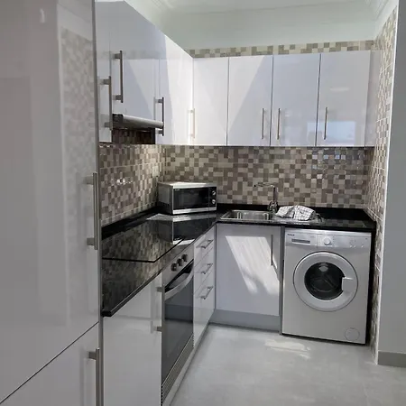 A6 Caleton Blanco Апартаменти
